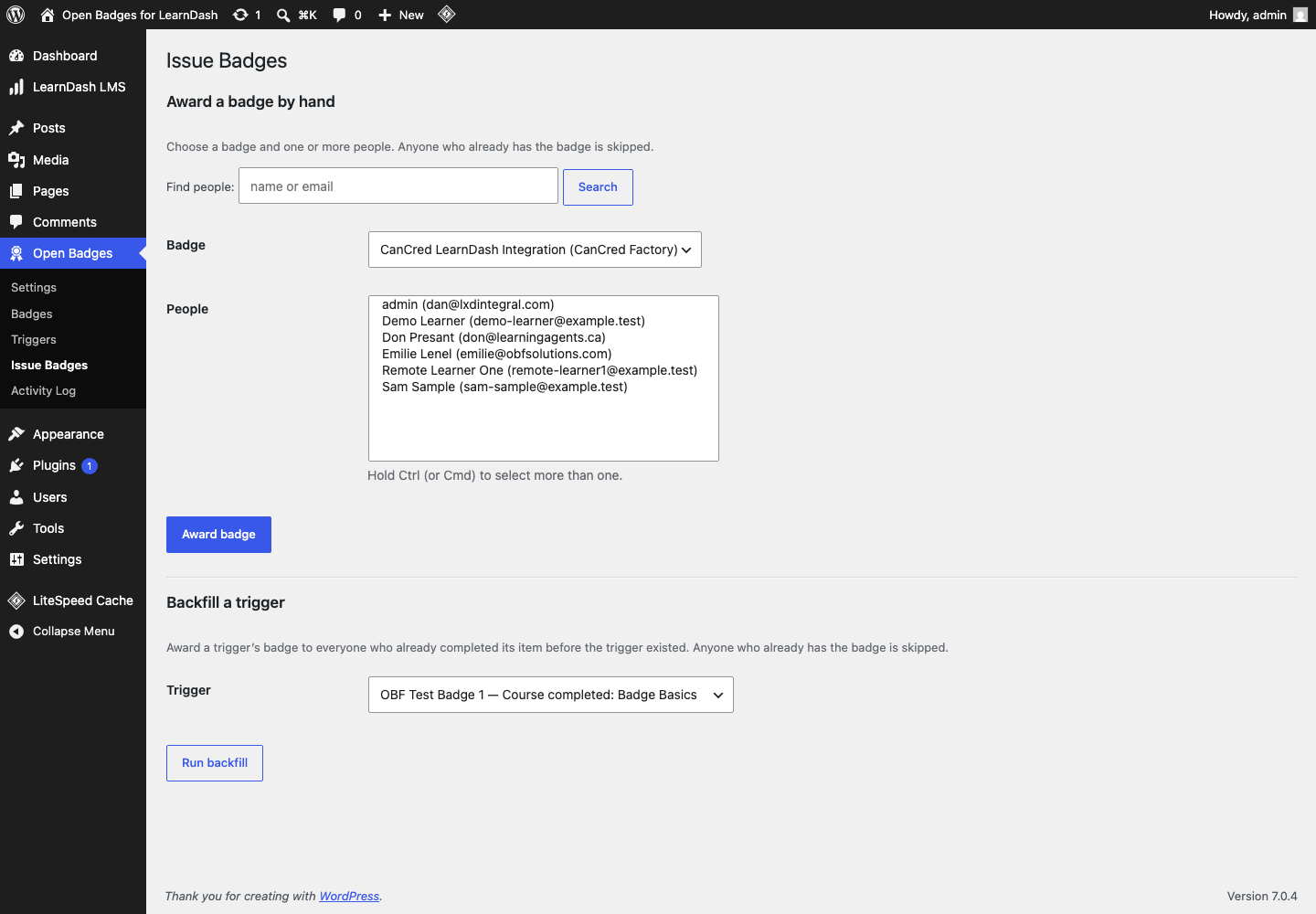 Issue Badges screen with manual issuance and backfill sections